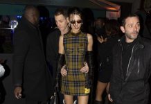 Маленькое клетчатое платье и стеганые сапоги: Белла Хадид вместе с парнем на показе Off-White