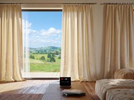 Гармония стиля, практичность и комфорт: шторы на заказ с автоматическим управлением для загородного дома